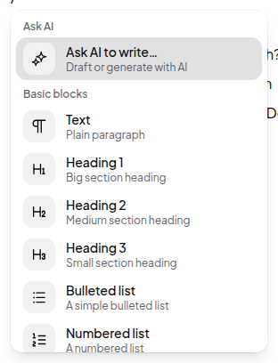 The slash menu, listing Ask AI and the basic blocks