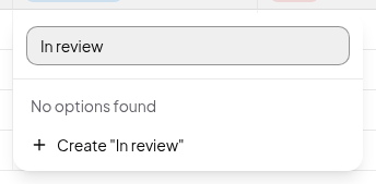 Typing a new option name shows a Create "In review" row in the picker